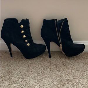 Vince Camuto heeled booties.
